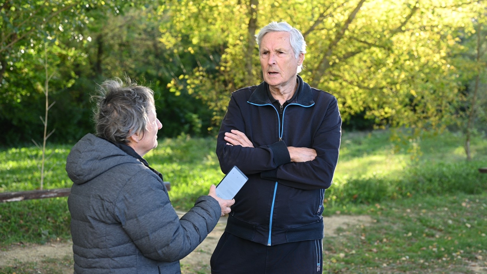 A man being interviewed about an old heritage game which is being preserved by his association