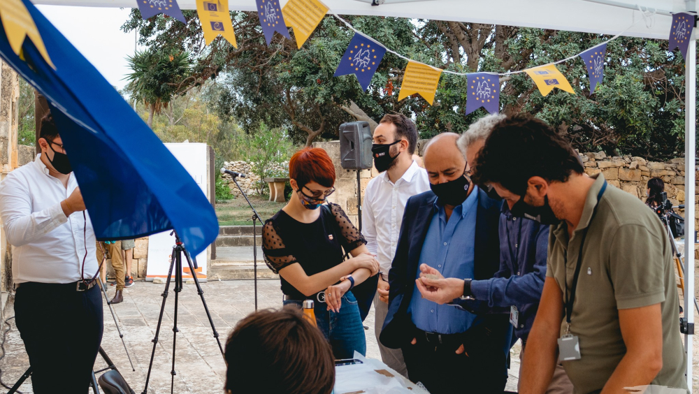A shot from 'A Punic Discovery'. The Culture Minister visitng the Punic Exhibition and the pottery workshops during the organisation's launch