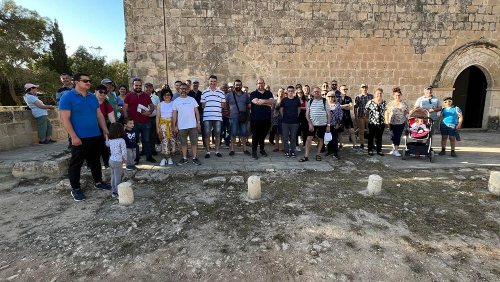 Attendees of an events revolving around Gudja's chapels, posing for a photo at Birmiftuħ, one of Malta's oldest chapels