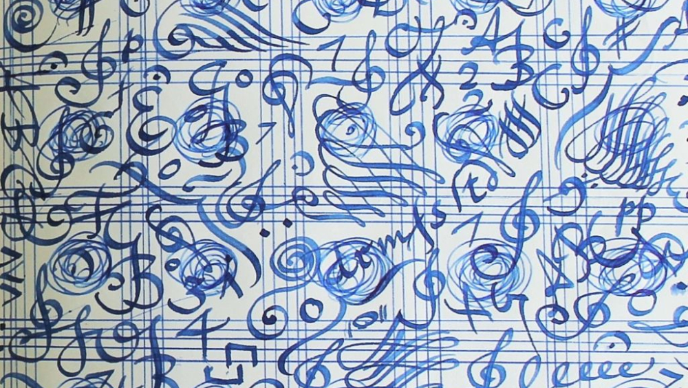 Swirling blue musical notation creates an artistic image