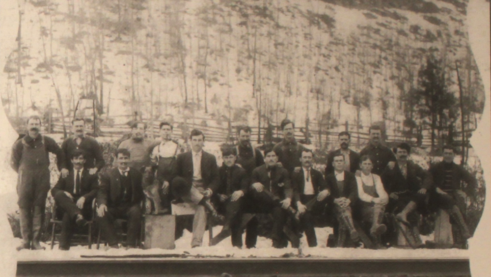 Workers by the railway. In the background the Mount Vermion covered with snow. Photographic Archive of Takis Mpaitsis