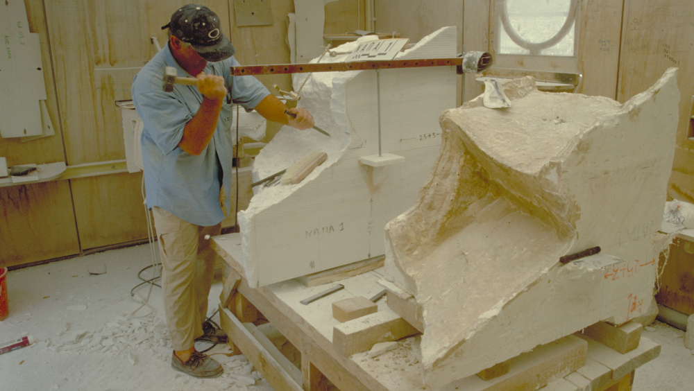 A marble technician working with the pontadoros.