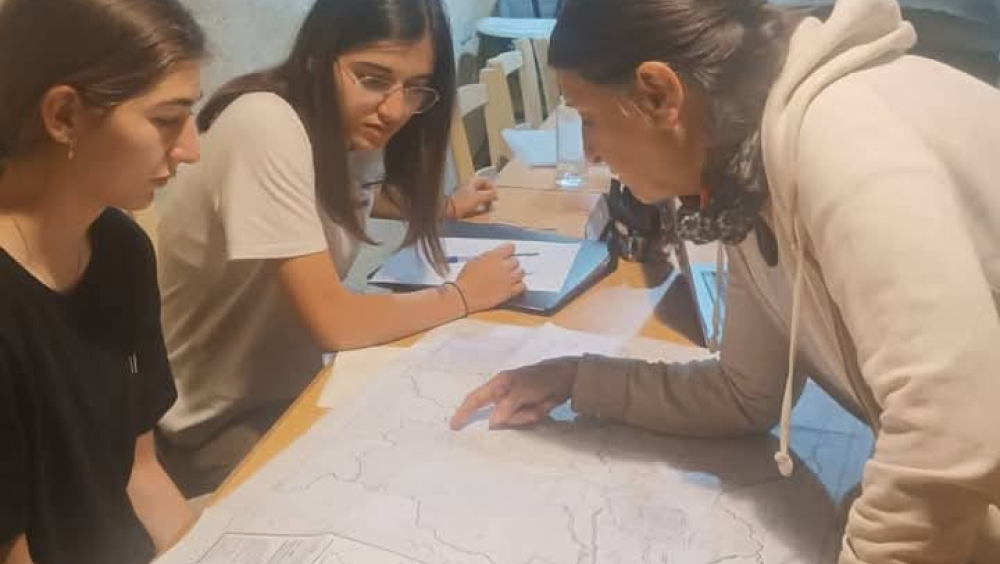 Mapping heritage trails with sisters Andrea and Melina Panayiotou, local schoolgirls.