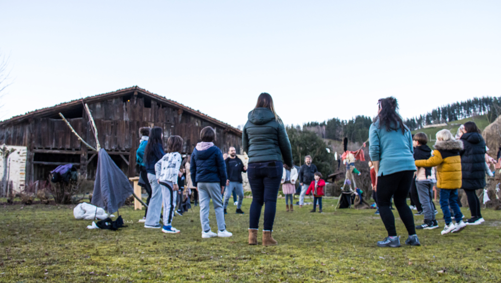 INTERGENERATIONAL ACTIVITIES OUTSIDE IGARTUBEITI FRAMHOUSE MUSEUM