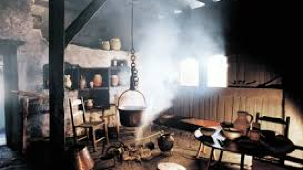 THE DARK KITCHEN OF THE IGARTUBEITI FARMHOUSE