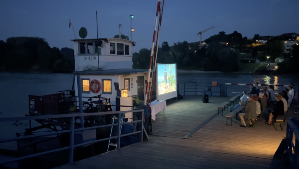 Event with reading and screening at Ottensheim, Danube Ferry on July 20