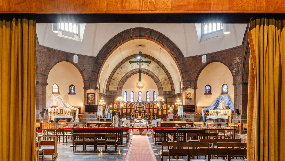 Architectuur met vertraging: de opeenvolgende plannen van de Heilig Hartkerk