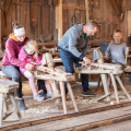 Tag des Denkmals being celebrated in Austria in 2022 - adults and children in a carpentry workshop