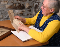 An elderly lady telling the story of her family