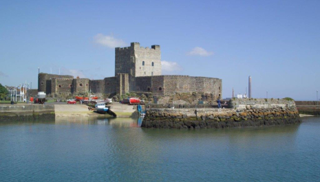 Carrickfergus Castle, situated in the town of Carrickfergus in County Antrim, on the northern shore of Belfast Lough.