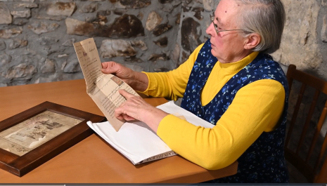 An elderly lady telling the story of her family