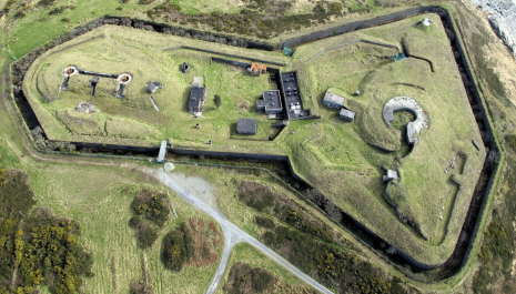 An aerial view of Lonehort Battery, Bere Island showing the deep moat surrounding the site.